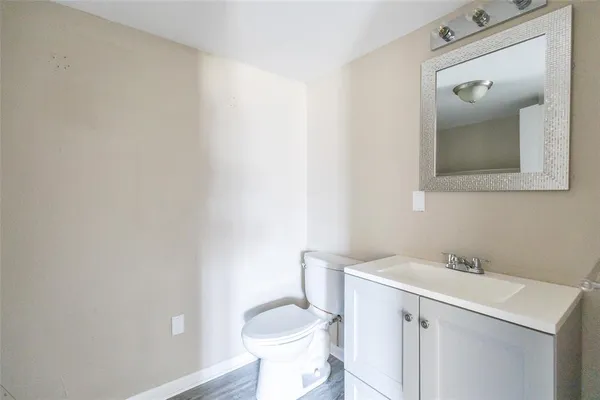 a bathroom with a sink and a toilet