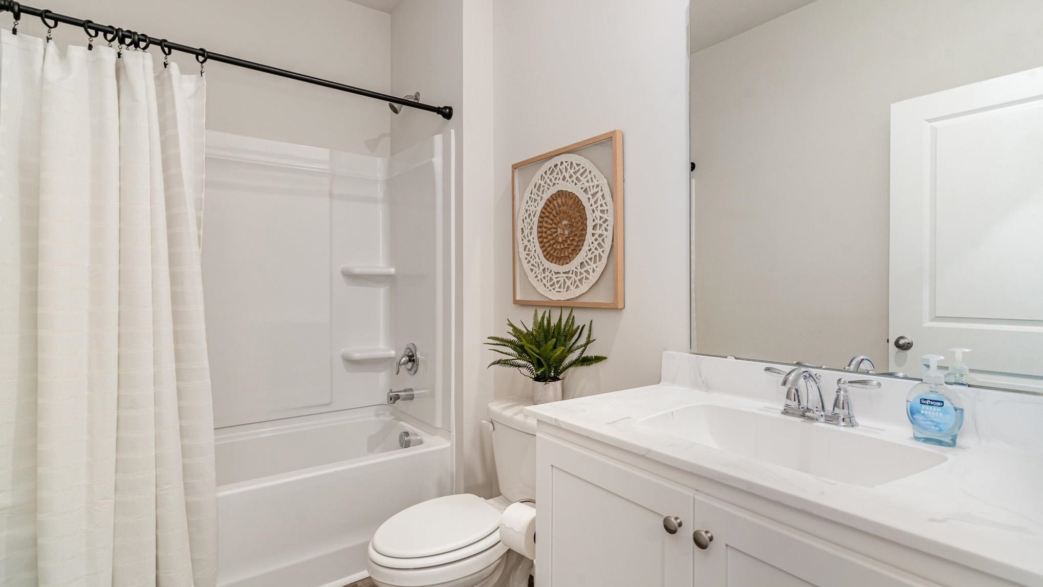 885 Farmers Psge Loop Loris, SC 29569 - Photo 22 of 24 Full bath featuring shower / bath combo with shower curtain and vanity