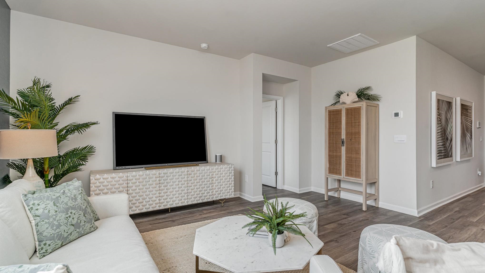 885 Farmers Psge Loop Loris, SC 29569 - Photo 6 of 24 Living room with wood finished floors and baseboards