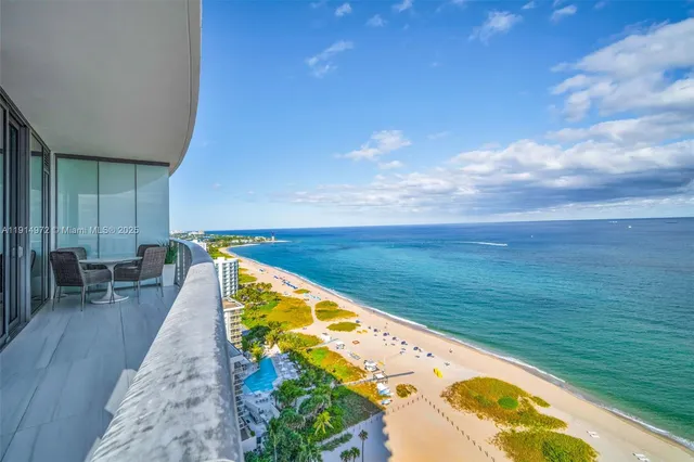a view of balcony with furniture