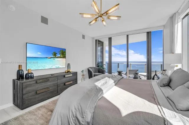 a bathroom with a tub and a shower