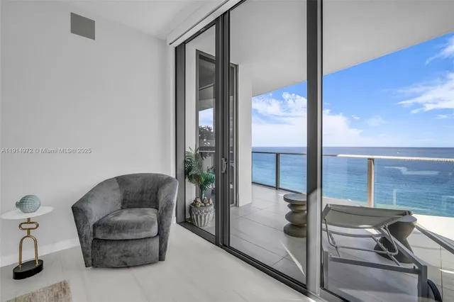 a bathroom with a bathtub a sink a vanity and a window