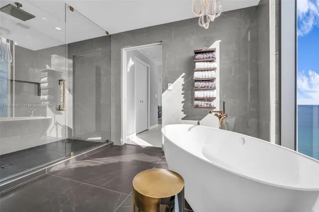 a kitchen with a refrigerator and white sink