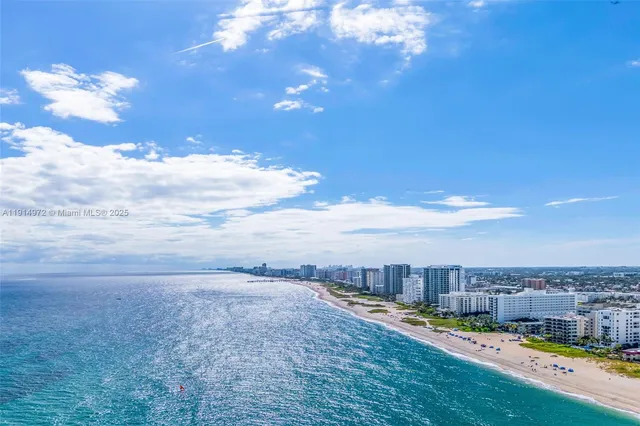 a view of a room with lots of green space