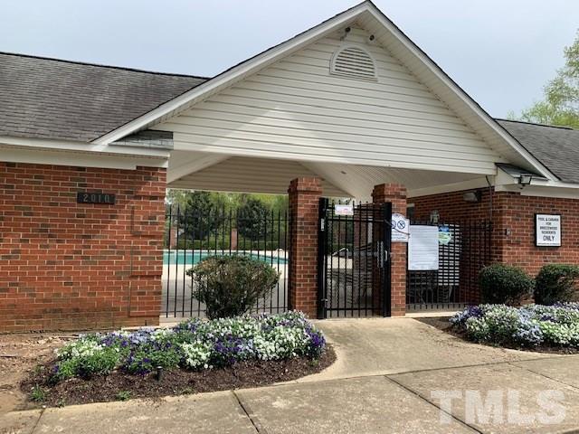 2111 Piney Brook Road, Unit 107 Raleigh, NC 27614 - Photo 21 of 23 a front view of a house with garden