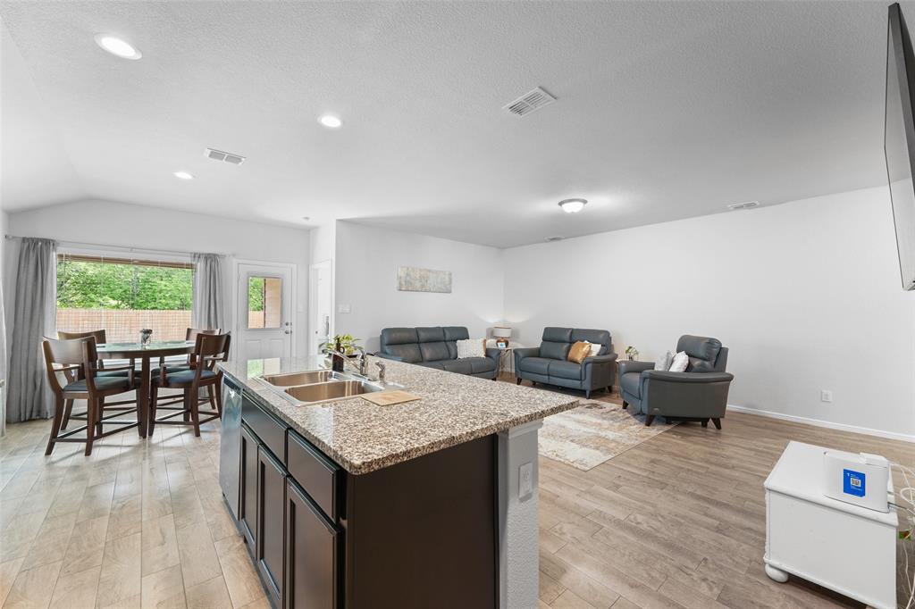 9020 Ridgeriver Way Fort Worth, TX 76131 - Photo 11 of 26 a kitchen with granite countertop lots of counter top space
