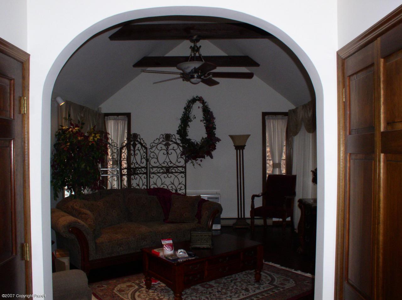 1110 Kroucher Road Stroudsburg, PA 18360 - Photo 2 of 19 a living room with furniture and a mirror