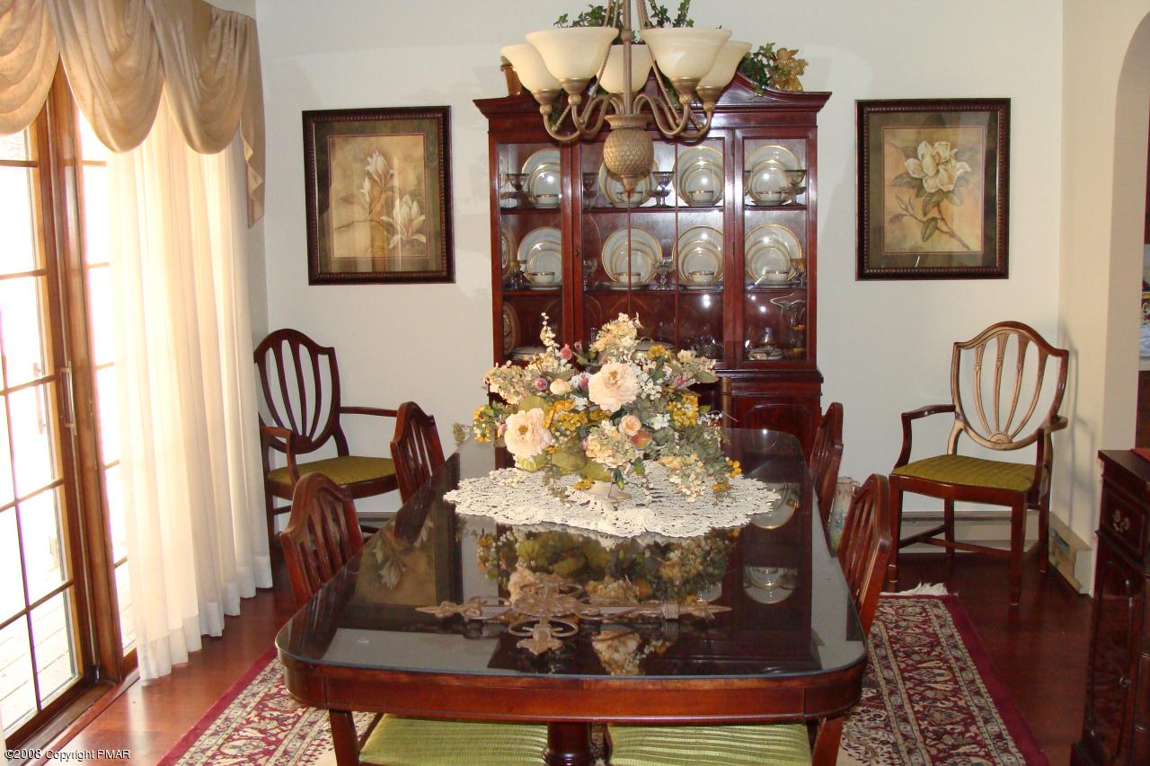 1110 Kroucher Road Stroudsburg, PA 18360 - Photo 3 of 19 a view of a dining room with furniture and chandelier