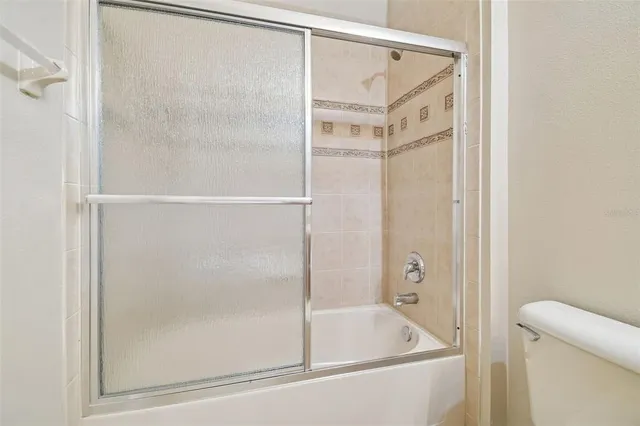 a bathroom with a sink double vanity and a mirror