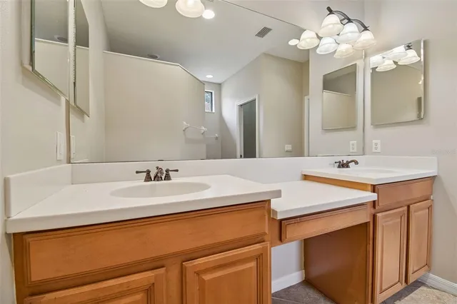 a view of a swimming pool with a yard