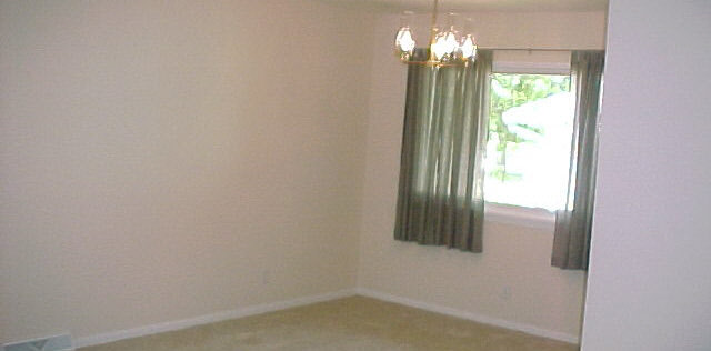 4808 Highcrest Road Rockford, IL 61107 - Photo 6 of 6 a view of a chandelier in a room