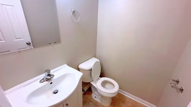 a bathroom with a sink and a toilet