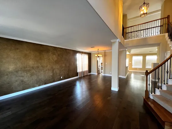 a view of gallery with wooden floor