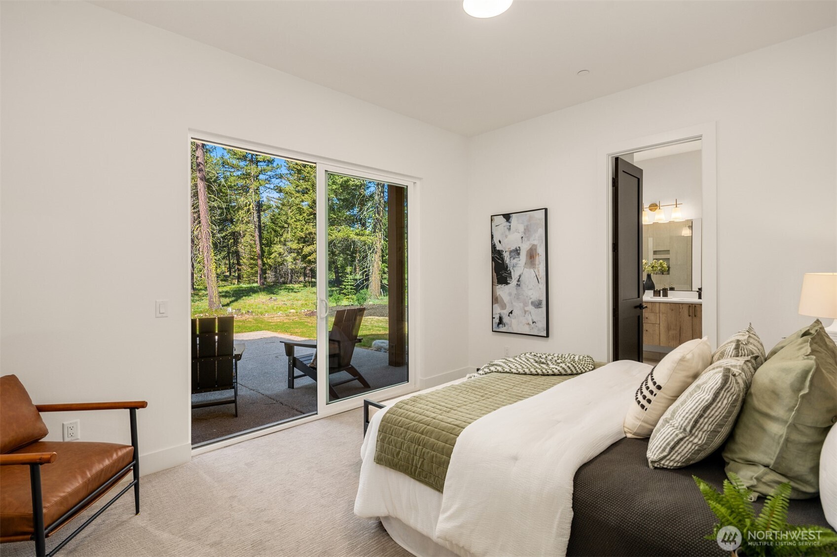 2010 Wanawish Loop Ronald, WA 98940 - Photo 13 of 28 a bedroom with a large bed and a large window