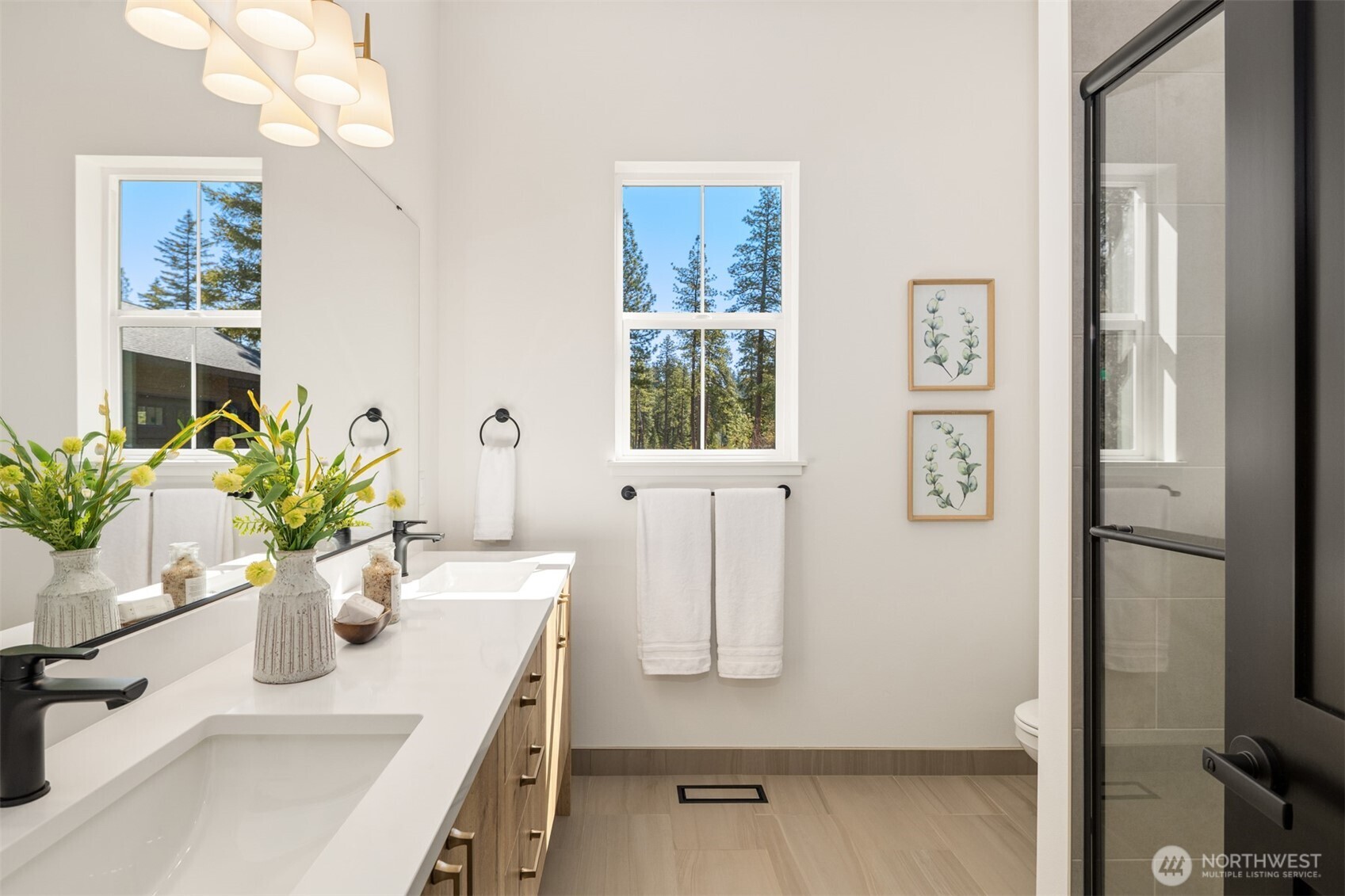 2010 Wanawish Loop Ronald, WA 98940 - Photo 16 of 28 a bathroom with a sink a mirror and a potted plant