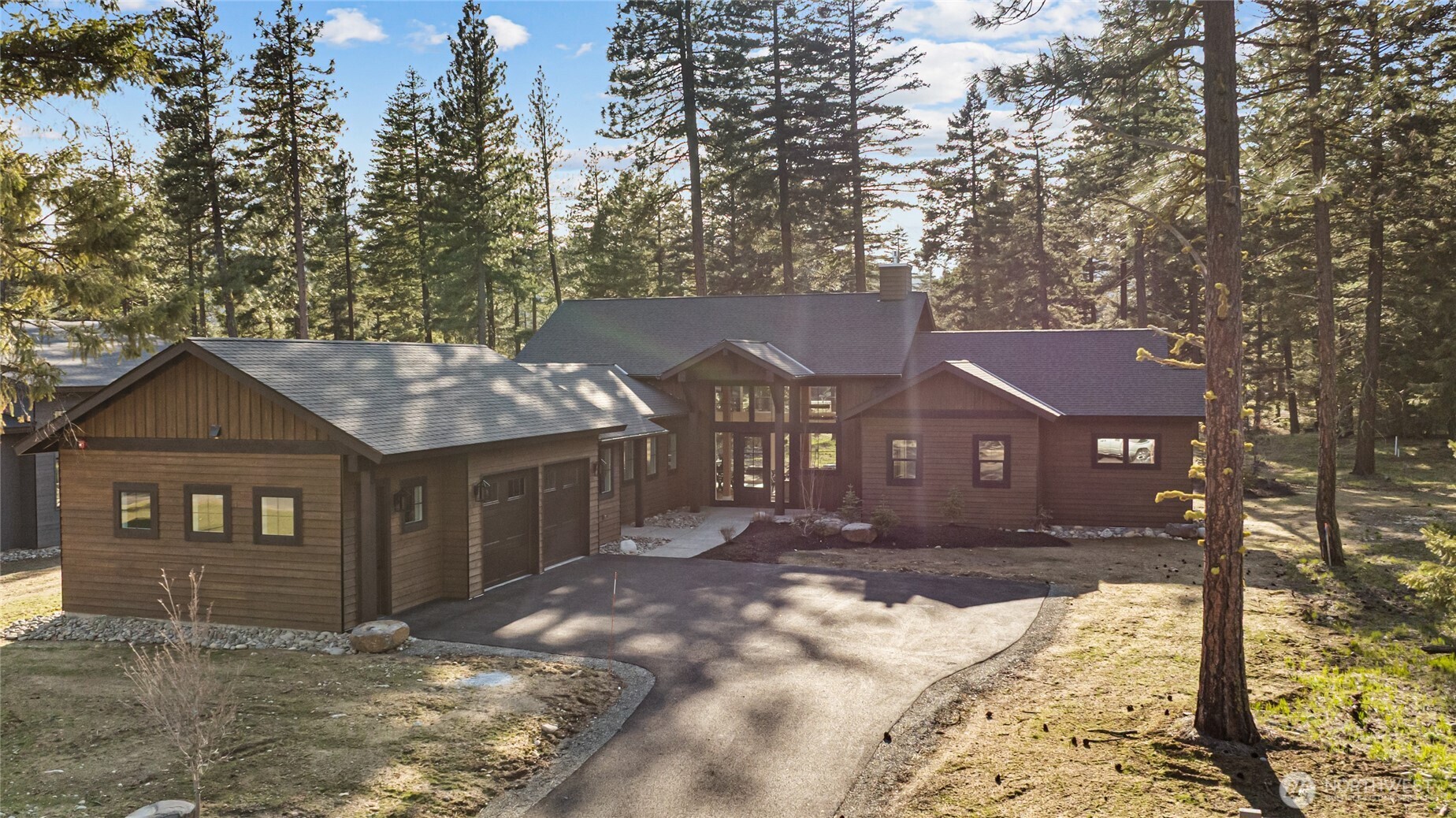 2010 Wanawish Loop Ronald, WA 98940 - Photo 27 of 28 a front view of a house with a yard