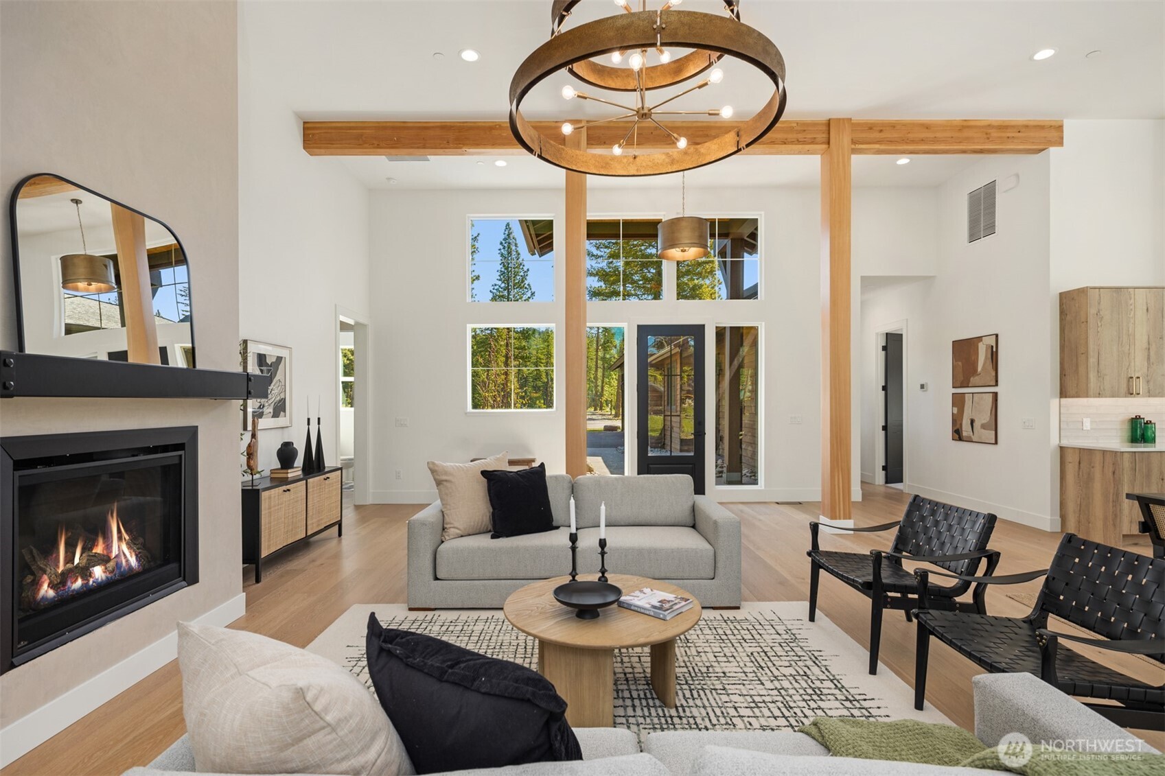 2010 Wanawish Loop Ronald, WA 98940 - Photo 6 of 28 a living room with furniture a fireplace and a large window