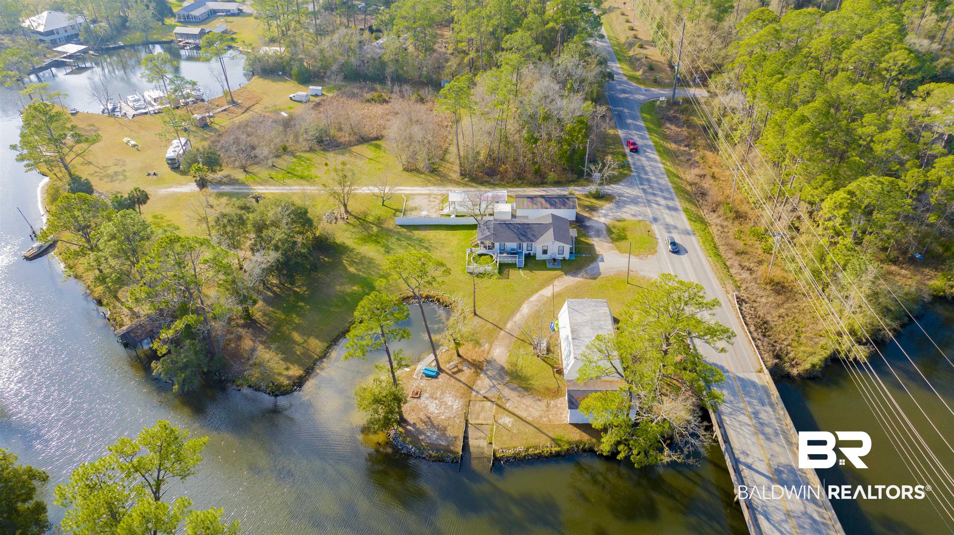 23770 Miflin Road Elberta, AL 36530 - Photo 35 of 38 Drone / aerial view of a large body of water