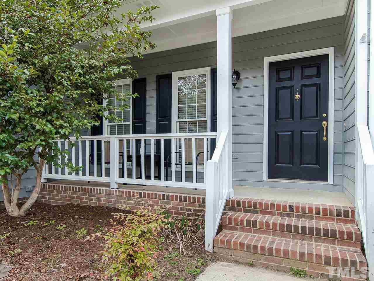 5424 Stewartby Drive Raleigh, NC 27613 - Photo 2 of 25 front view of a house with a window
