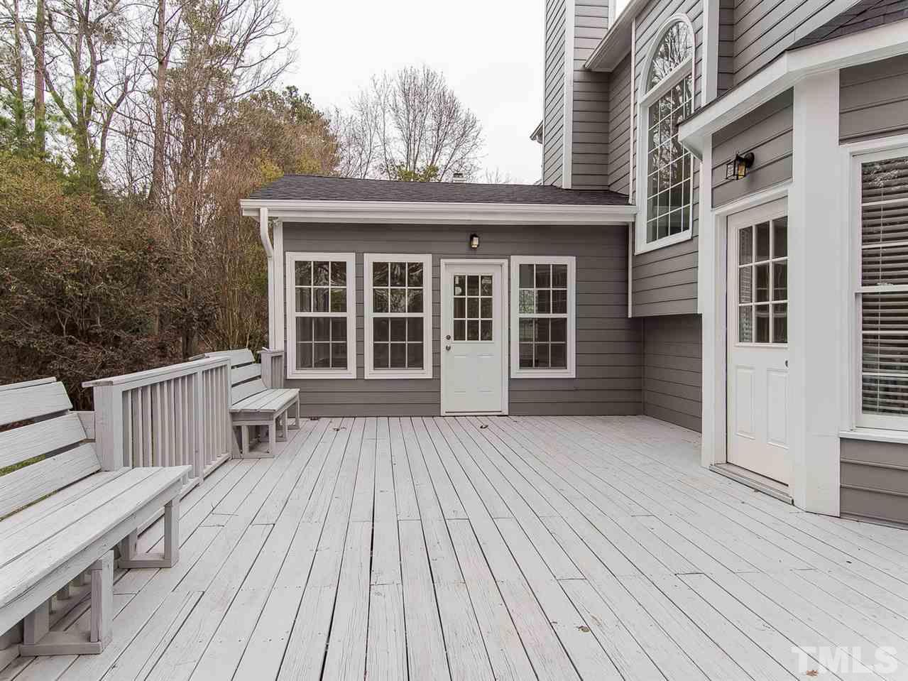 5424 Stewartby Drive Raleigh, NC 27613 - Photo 21 of 25 a view of a house with wooden floor