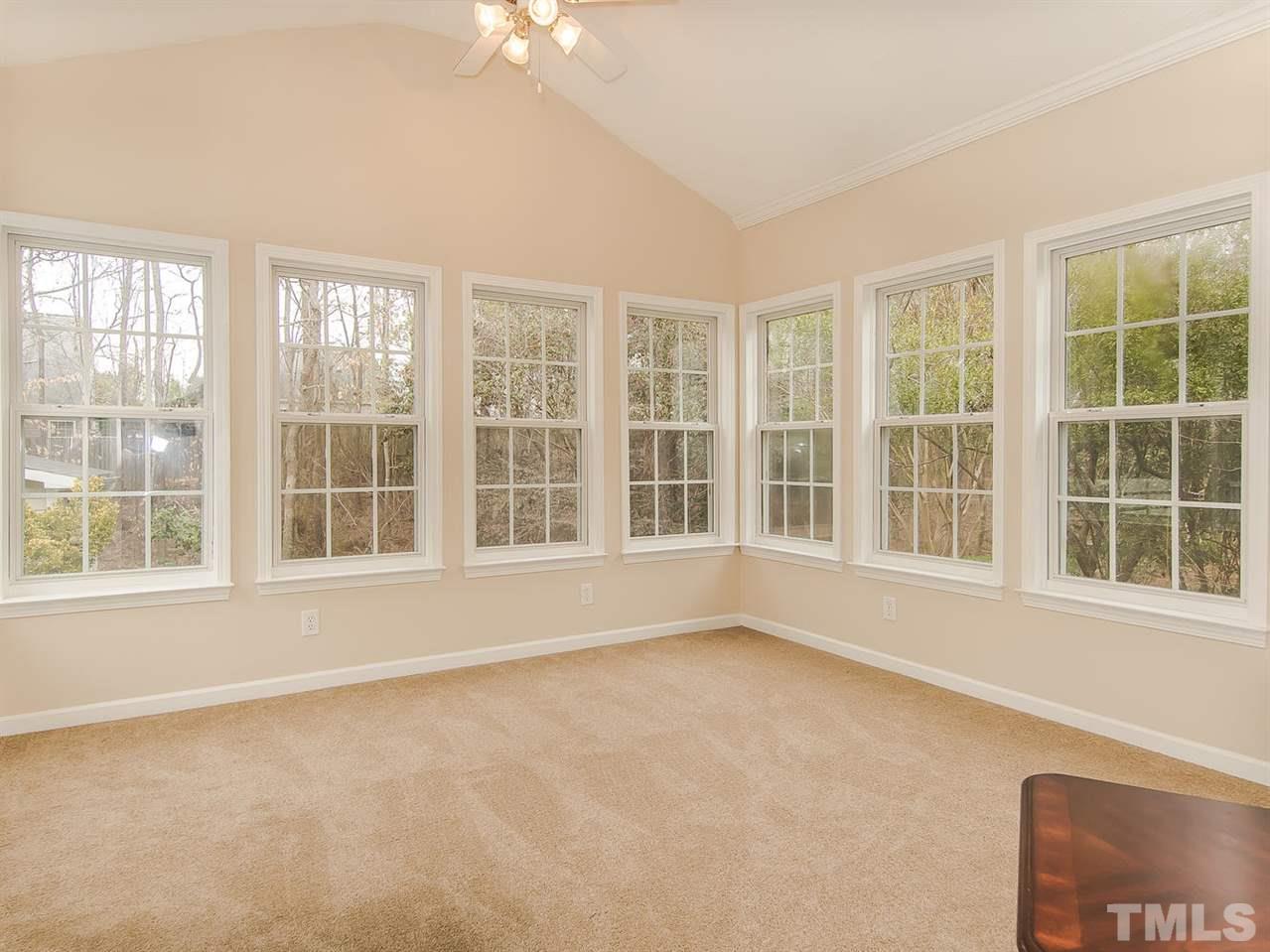 5424 Stewartby Drive Raleigh, NC 27613 - Photo 22 of 25 a view of an empty room with a window