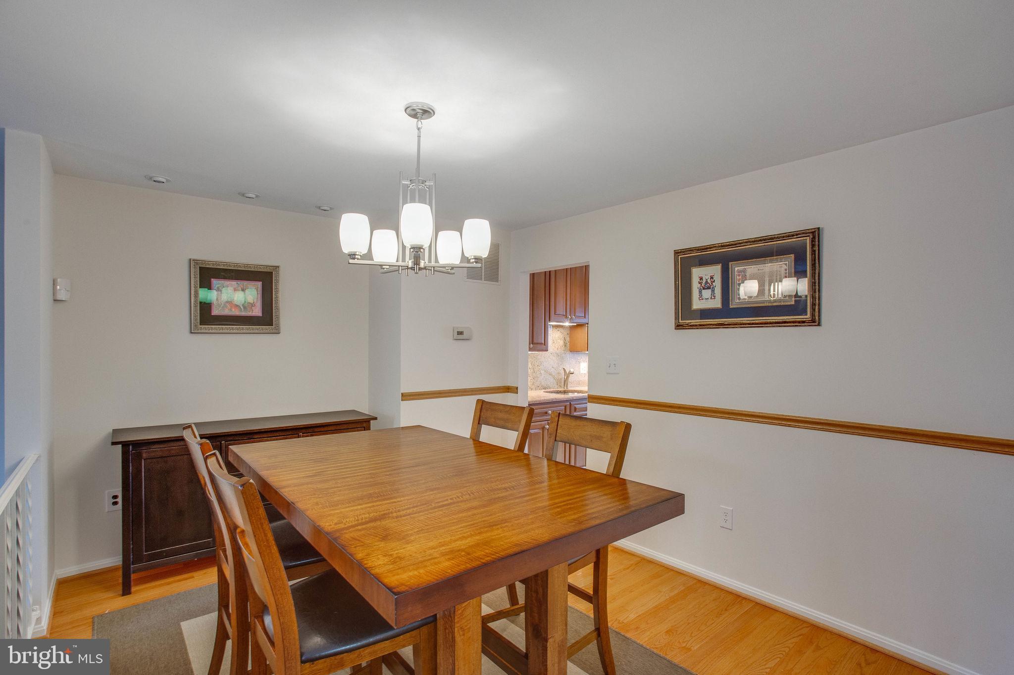 7416 Spring Tree Drive Springfield, VA 22153 - Photo 20 of 53 Updated chandelier and chair rails