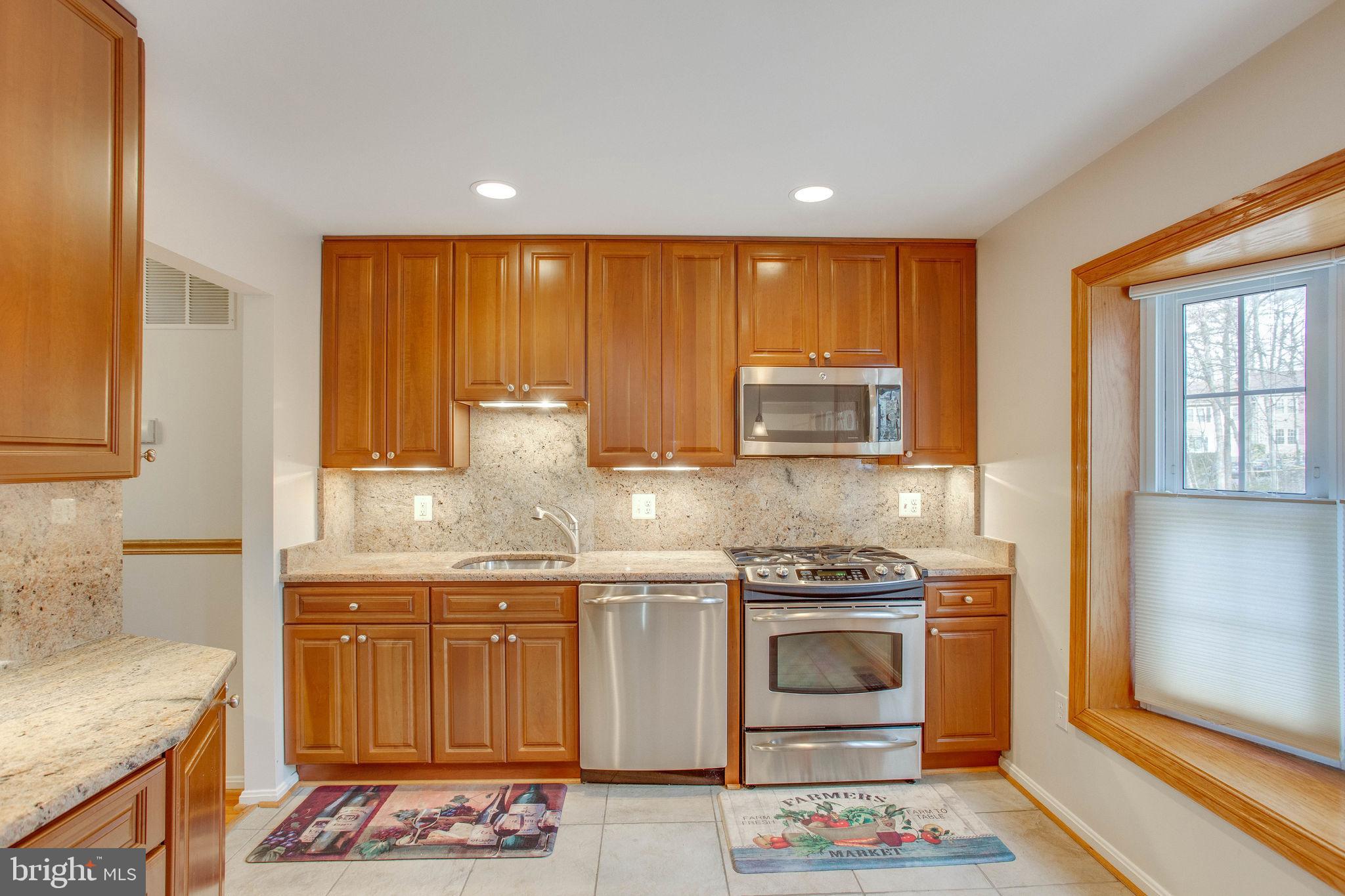 7416 Spring Tree Drive Springfield, VA 22153 - Photo 23 of 53 Gourmet kitchen with stainless steel appliances