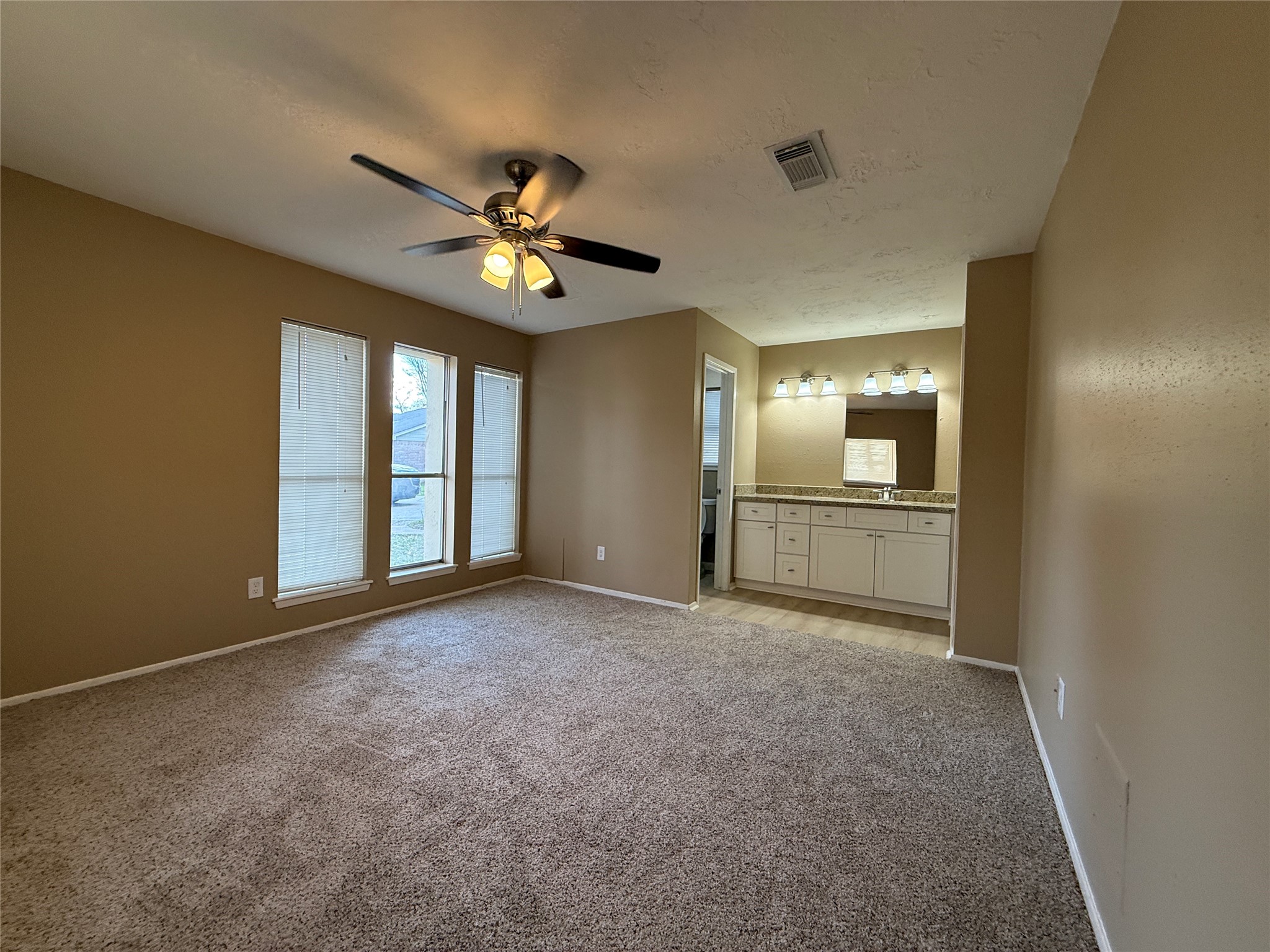 4738 Fleming Downe Lane Spring, TX 77388 - Photo 10 of 14 a view of n empty room and a ceiling fan