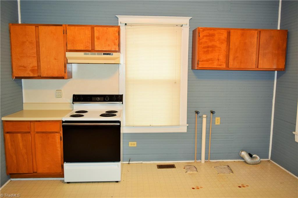 209 East Decatur Street Madison, NC 27025 - Photo 10 of 17 Another view kitchen and laundry combo area