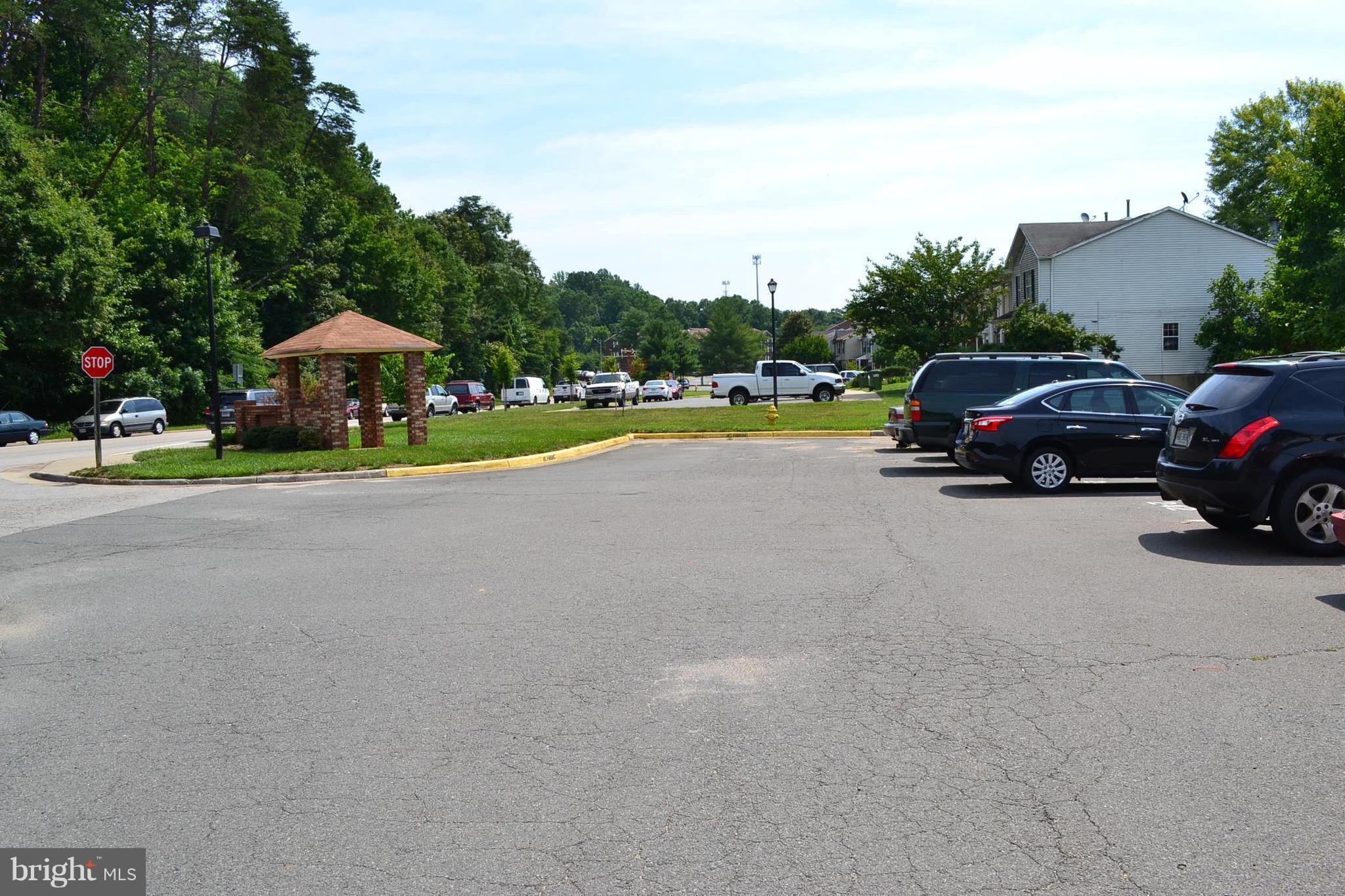 15238 Cloverdale Road Woodbridge, VA 22193 - Photo 2 of 19 a view of street with parked cars