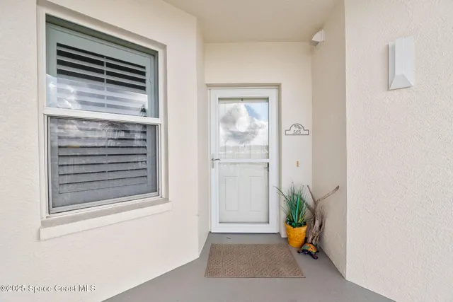 a view of an entryway and a window