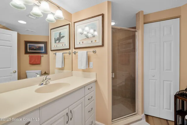 a utility room with sink dryer and washer