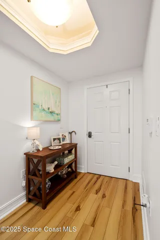 a room with a bed and furniture