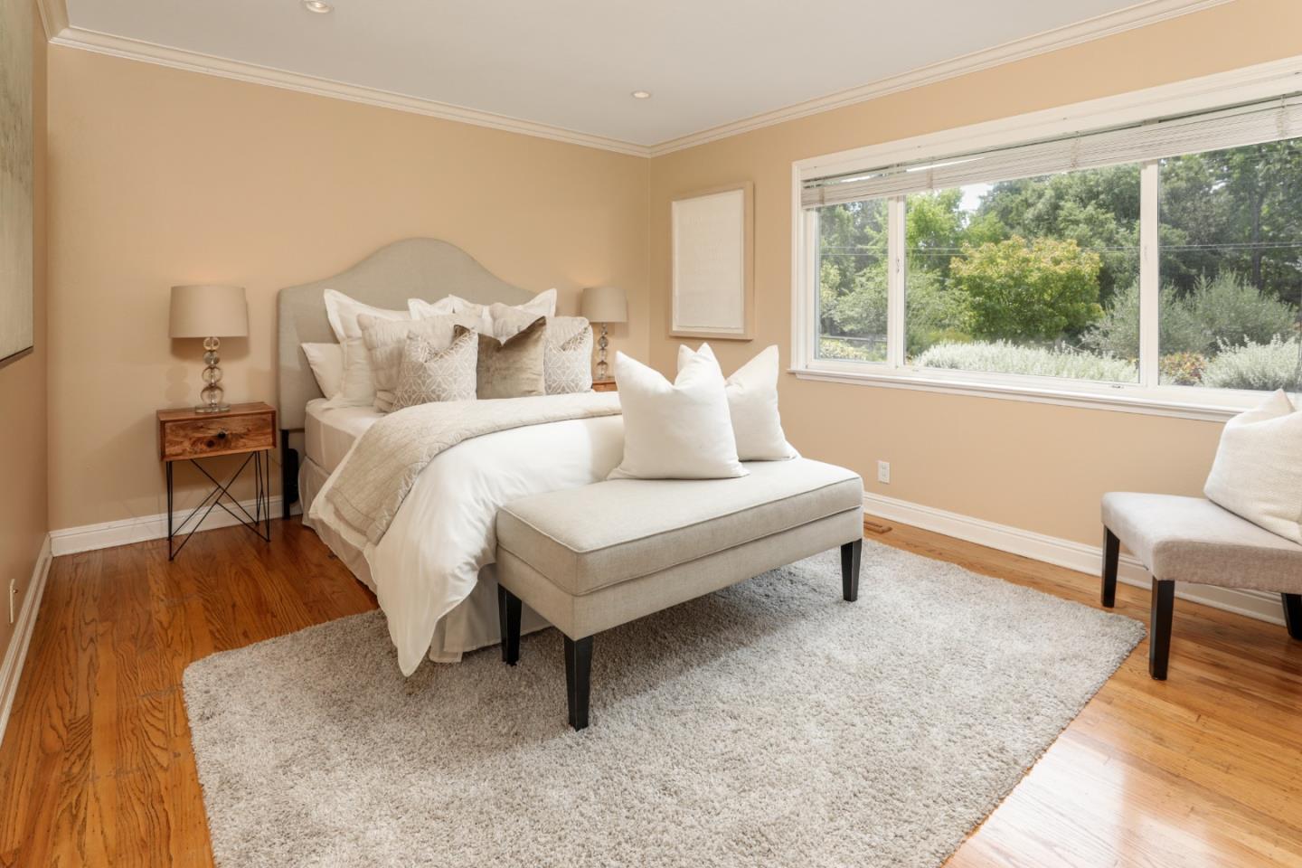 460 Cervantes Road Portola Valley, CA 94028 - Photo 17 of 45 a bed room with a bed and a chair