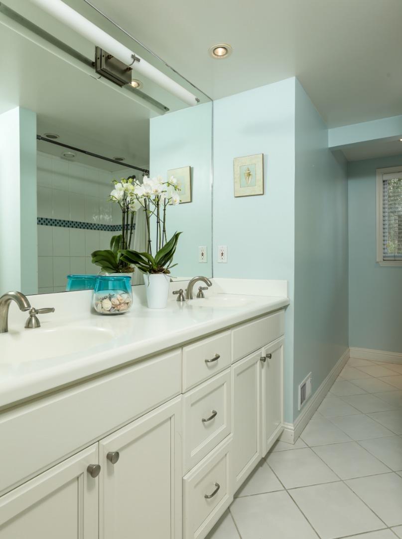 460 Cervantes Road Portola Valley, CA 94028 - Photo 18 of 45 a bathroom with a sink and a mirror