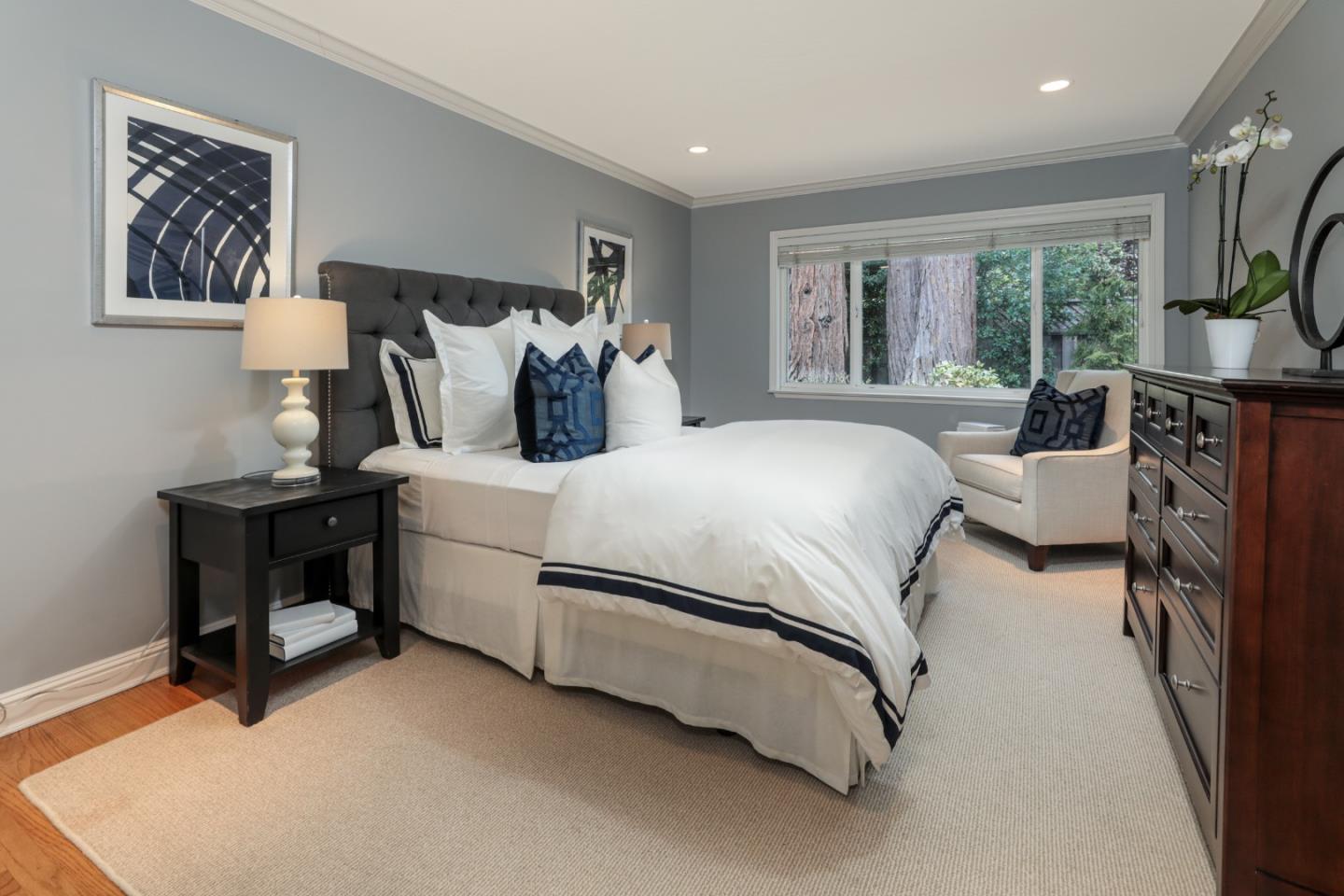 460 Cervantes Road Portola Valley, CA 94028 - Photo 19 of 45 a bed room with a bed and a flat tv screen