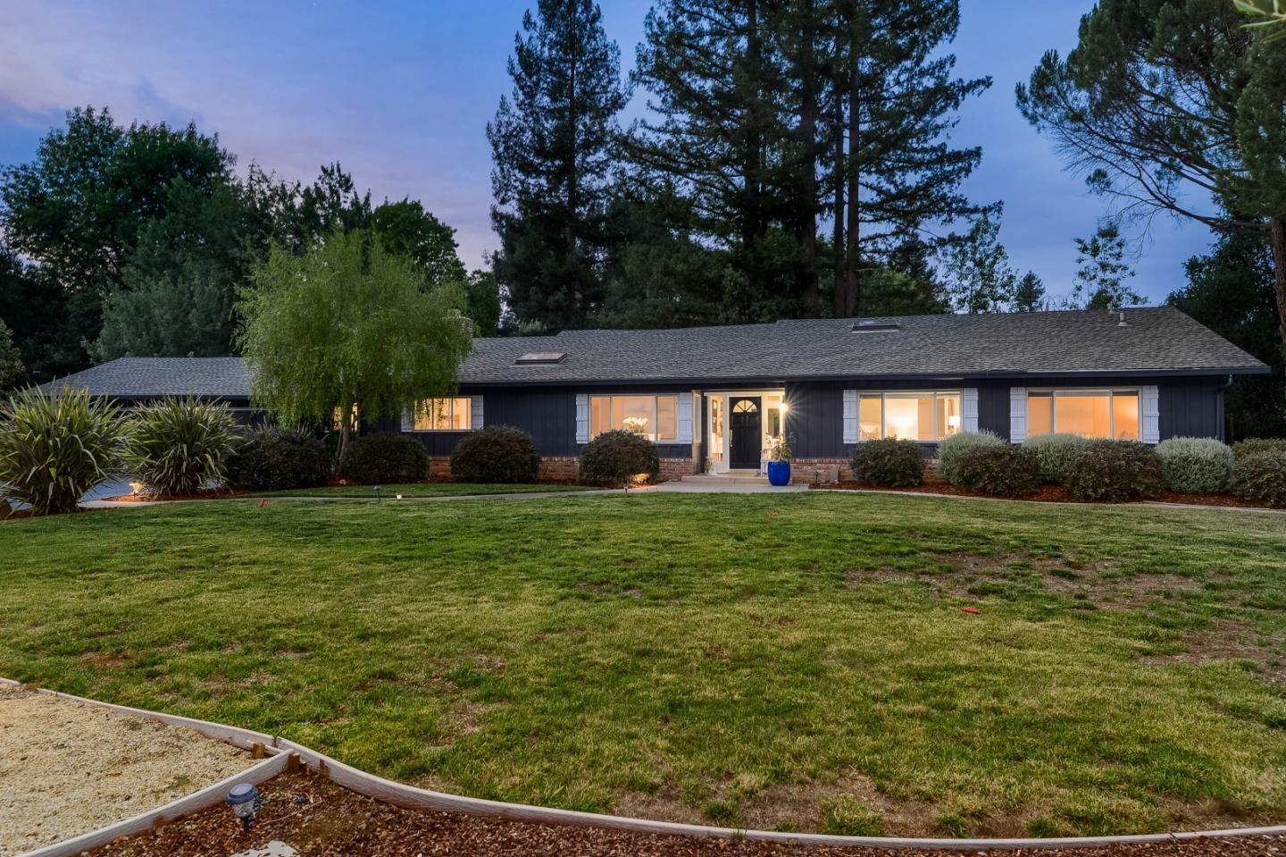 460 Cervantes Road Portola Valley, CA 94028 - Photo 2 of 45 a front view of a house with a yard