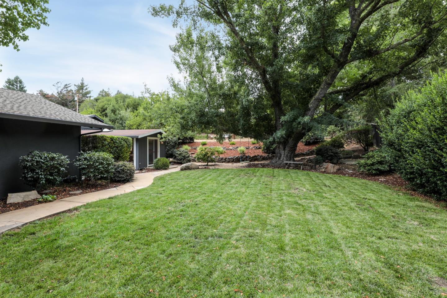 460 Cervantes Road Portola Valley, CA 94028 - Photo 22 of 45 a view of house with backyard space and garden