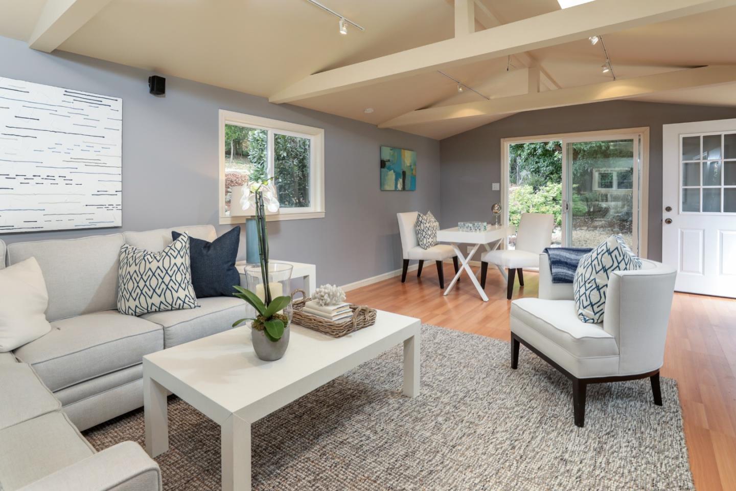 460 Cervantes Road Portola Valley, CA 94028 - Photo 24 of 45 a living room with furniture and a large window