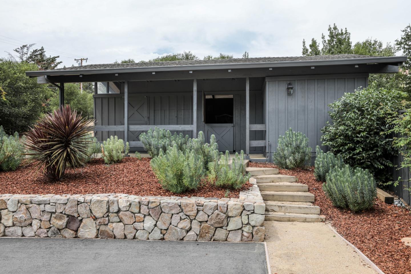 460 Cervantes Road Portola Valley, CA 94028 - Photo 26 of 45 a front view of a house with a garden