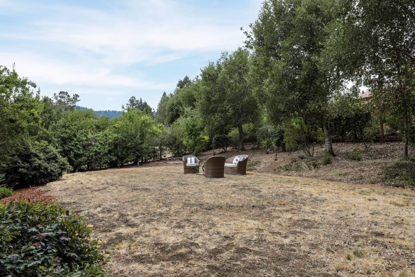 460 Cervantes Road Portola Valley, CA 94028 - Photo 28 of 45 a view of a fire pit with large trees