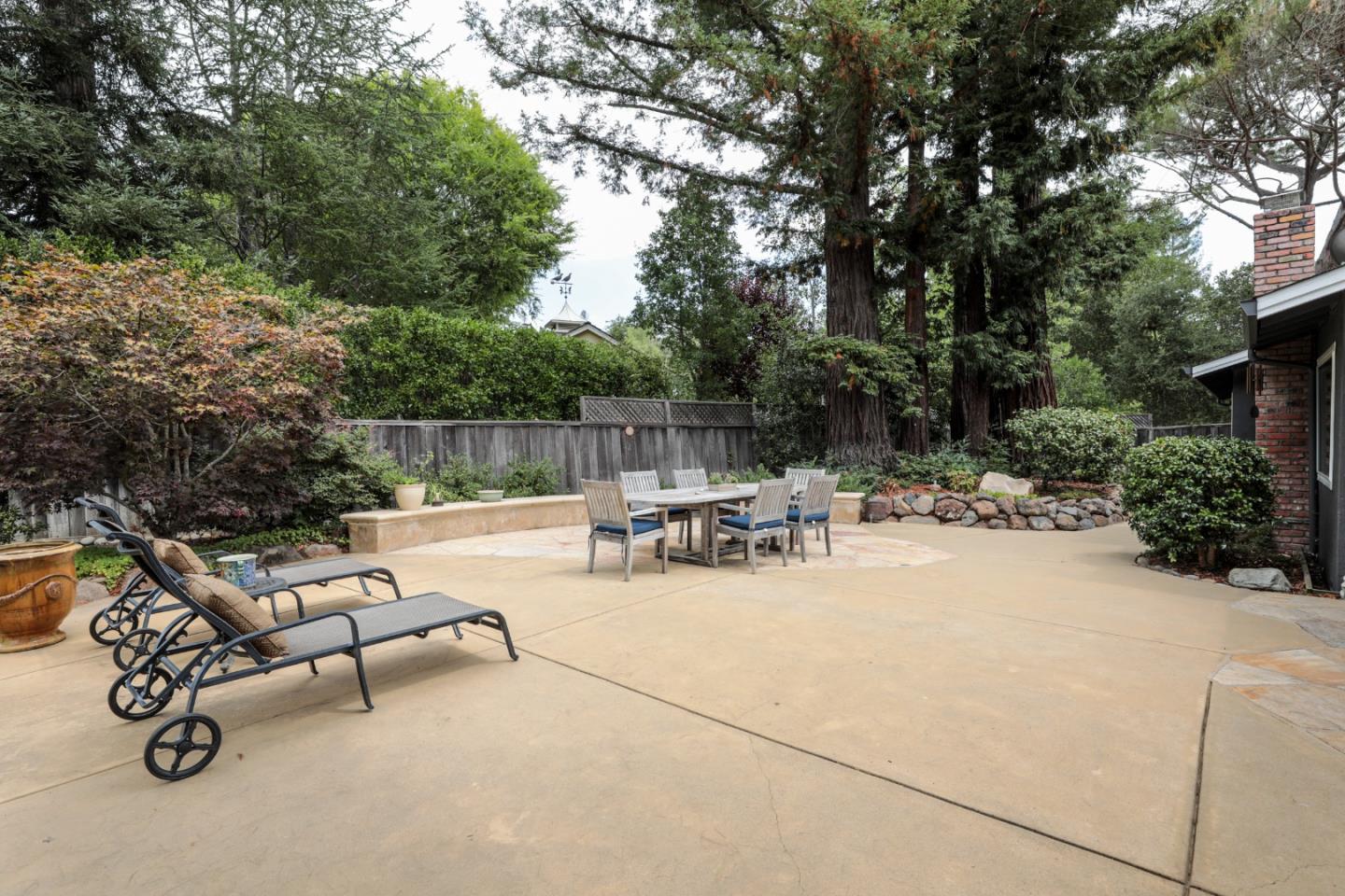 460 Cervantes Road Portola Valley, CA 94028 - Photo 41 of 45 a view of backyard with swimming pool and sitting area