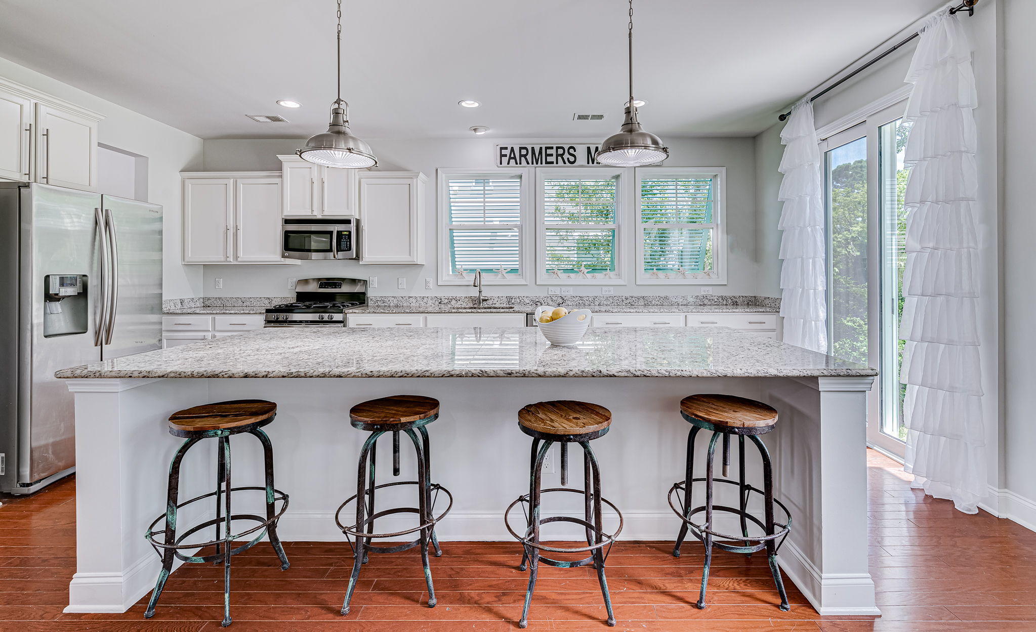 1049 Harbortowne Road Charleston, SC 29412 - Photo 12 of 44 Massive Granite Kitchen Island