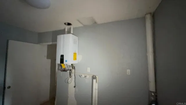 a view of a swimming pool and lounge chairs