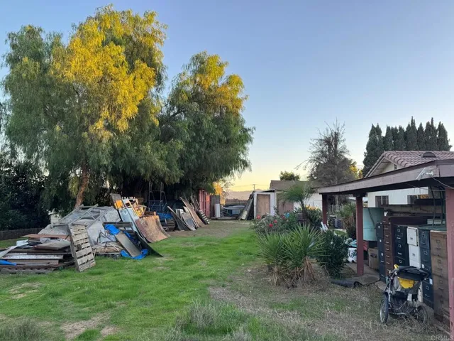 a view of outdoor sitting area with furniture