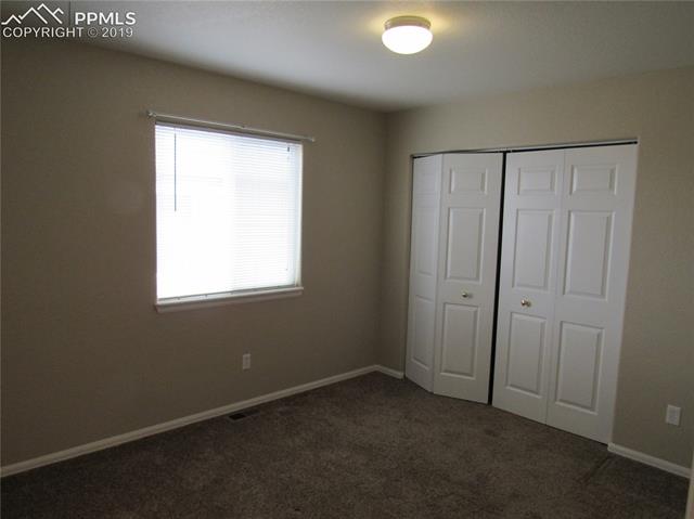 7334 Pearly Health Road Colorado Springs, CO 80908 - Photo 30 of 35 3rd and 4th bedrooms on upper level