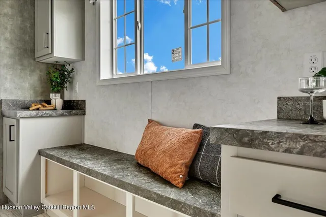 a living room with granite countertop furniture