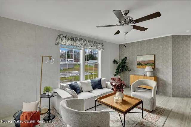 a living room with furniture and window