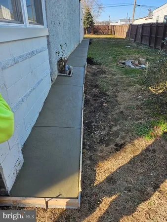 a view of a back yard of the house