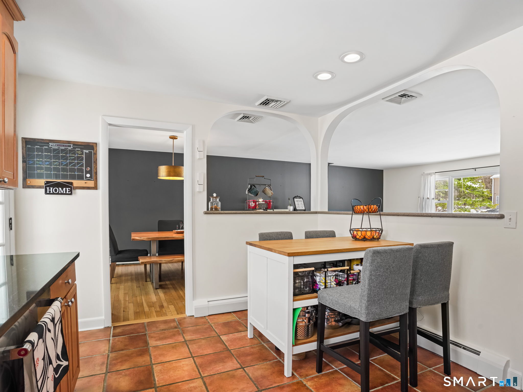 16 Deepdene Road Trumbull, CT 06611 - Photo 11 of 25 a view of a dining room with furniture and wooden floor
